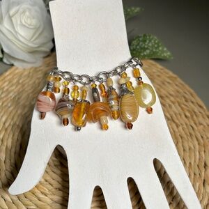 Brown Gold Amber Lamp Work Charm Bracelet with Art Glass Beads